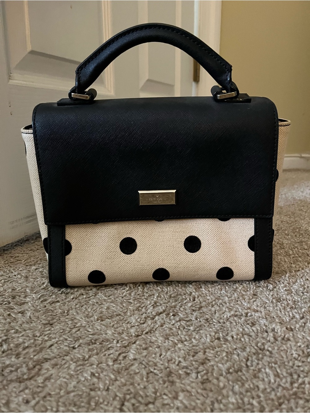 kate spade black saffiano leather satchel with gold plaque